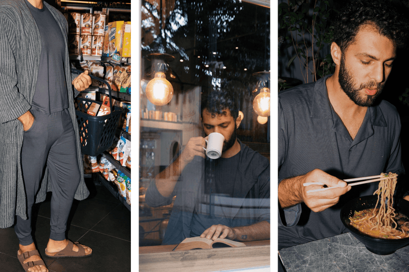 Man in dark grey loungewear outside 