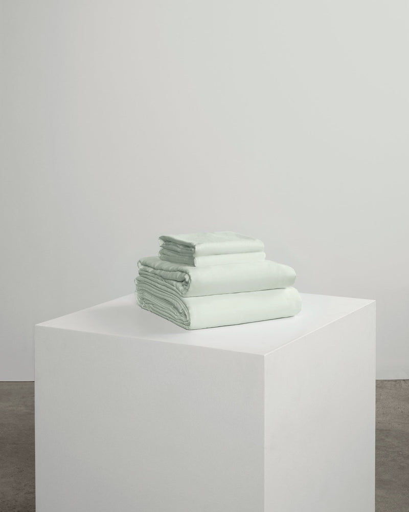 light green full bedding set including a fitted sheet, duvet cover and pillowcases