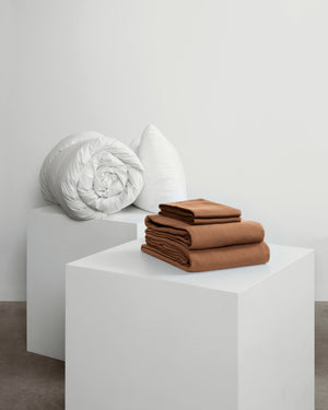 caramel brown pillowcase pair on white cube