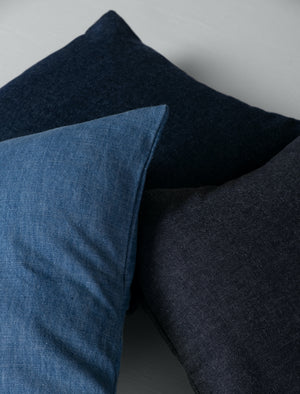 denim scatter cushions in light blue, grey and dark blue. 