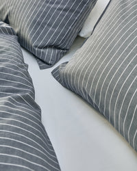 navy and white striped cotton bedding texture