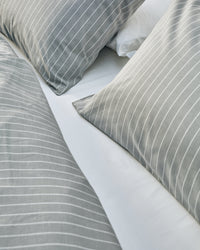grey and white striped cotton bedding texture